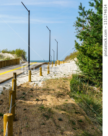 New modern beach access pathway with lighting in Liepaja, Latvia on Baltic Sea sandy dunes New modern beach access pathway with lighting in Liepaja, Latvia on Baltic Sea sandy dunes 131174614