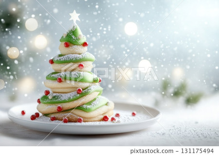Festive christmas tree cookie tower with icing and berries on holiday background 131175494