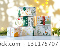 Stack of colorful gift boxes with ribbons on festive bokeh background 131175707