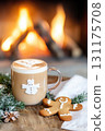 Cozy winter scene: cappuccino by the fireplace with gingerbread cookies 131175708