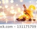 Festive mulled wine with orange and cinnamon amidst warm holiday lights 131175709