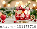 Festive holiday cranberry sangria with fresh fruit and bokeh lights 131175710