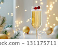 Festive champagne glass with cranberries and christmas decorations 131175711