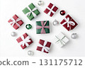 Festive christmas gifts with pine branches and ornaments for holiday celebration 131175712