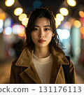 A gentle, smiling figure surrounded by city lights 131176113