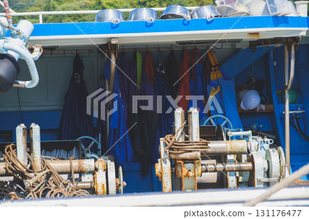 [Sakaiminato] Work clothes hanging inside a fishing boat 131176477