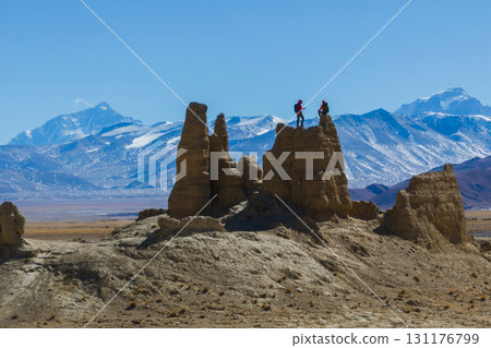 Two women hikers taking photo wiith Mount Everest in Tibet, China 131176799