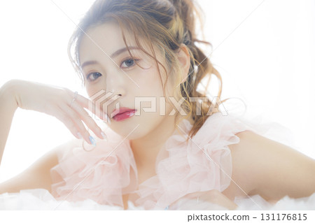 Woman in a pink tulle dress Woman in a pink tulle dress 131176815