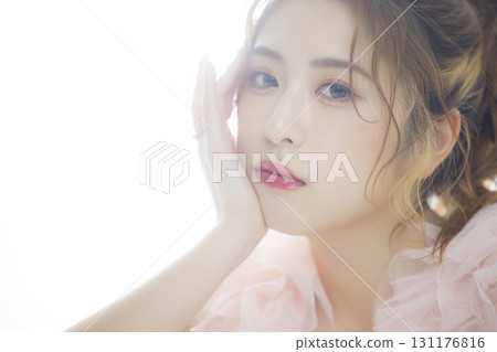 Woman in a pink tulle dress Woman in a pink tulle dress 131176816