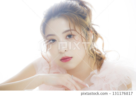 Woman in a pink tulle dress Woman in a pink tulle dress 131176817