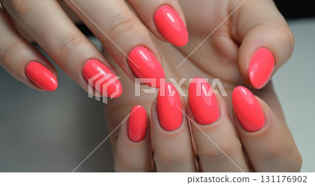 A close-up shot of a woman's hands with a perfect manicure 131176902