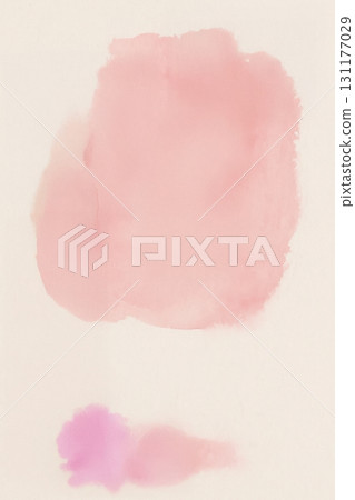 Soft pink watercolor paint blotches on white paper background 131177029