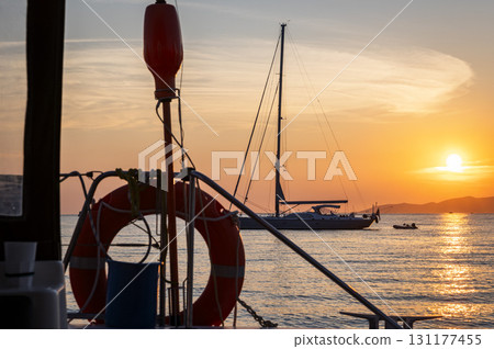 Sailboat on the sea by sunset Sailboat on the sea by sunset 131177455