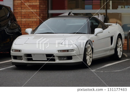 white domestic sports car 131177483