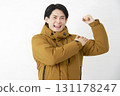 A man wearing a down jacket, motivated, white background 131178247