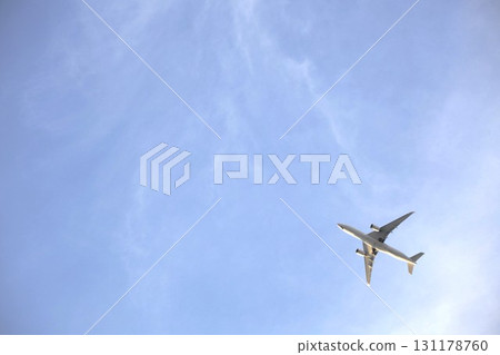An airplane flying over the sky An airplane flying over the sky 131178760