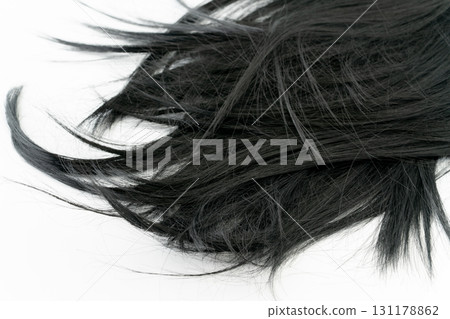 Black hair on a white background Black hair on a white background 131178862