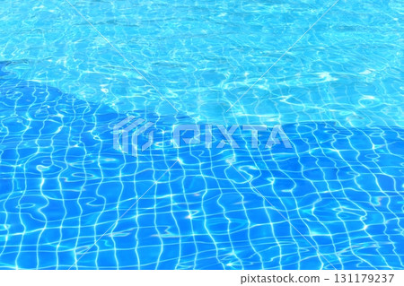 surface of blue swimming pool, freshness water background surface of blue swimming pool, freshness water background 131179237
