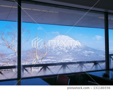 View of Mt. Yotei from inside the Ace Hill Rest House at Niseko Tokyu Grand Hirafu in the winter season View of Mt. Yotei from inside the Ace Hill Rest House at Niseko Tokyu Grand Hirafu in the winter season 131180356