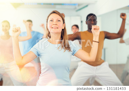 Adult woman learning dance in dance studio Adult woman learning dance in dance studio 131181433