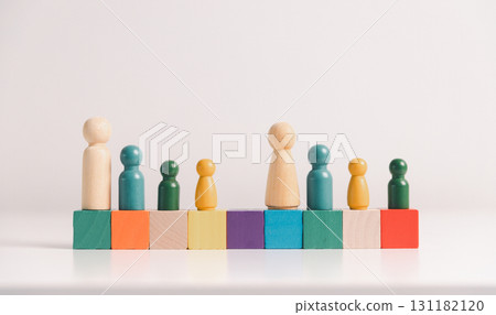 Concept of diversity, inclusion, equality is highlighted in team setup, wooden elements, symbolizing leadership, authority, influence, strong communication skills, inclusive organizational structure. Concept of diversity, inclusion, equality is highlighted in team setup, wooden elements, symbolizing leadership, authority, influence, strong communication skills, inclusive organizational structure. 131182120