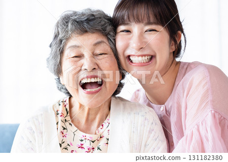 Smiling senior woman and young woman 131182380
