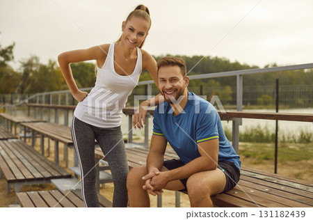 Young couple in sportswear at an outdoor stadium, close-up 131182439
