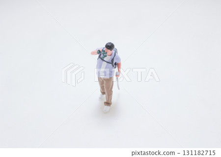 a Miniature Explorer Photographer With Backpack, Camera, 131182715