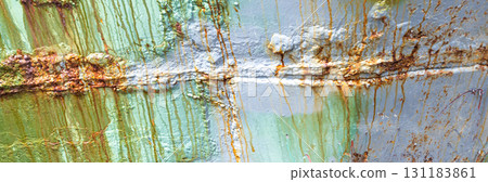 Paint and rust on the side of a fishing boat 131183861