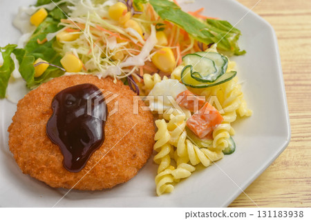 Croquettes and salad Croquettes and salad 131183938
