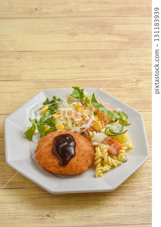 Croquettes and salad Croquettes and salad 131183939