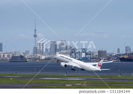 Scenery of Haneda Airport, plane taking off and Tokyo Skytree, Ota Ward, Tokyo Scenery of Haneda Airport, plane taking off and Tokyo Skytree, Ota Ward, Tokyo 131184144