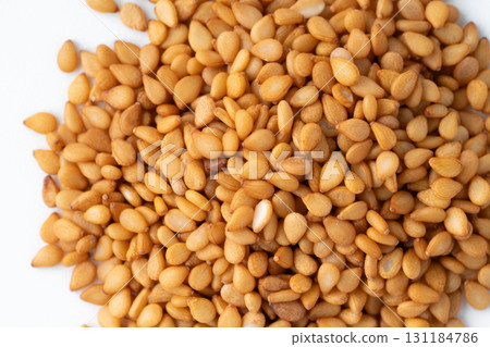 Close-up of golden sesame seeds (raw sesame seeds) Close-up of golden sesame seeds (raw sesame seeds) 131184786