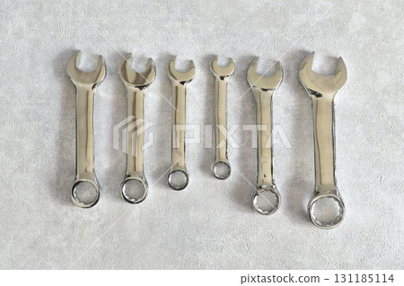 Tools lined up in a row: spanners Tools lined up in a row: spanners 131185114