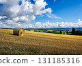 Summertime Senbo Pass with hay rolls (Kami-furano, Hokkaido) 131185316