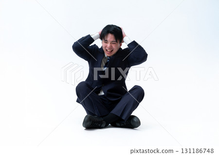 Worried young businessman 131186748