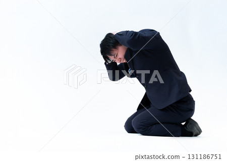 Worried young businessman Worried young businessman 131186751