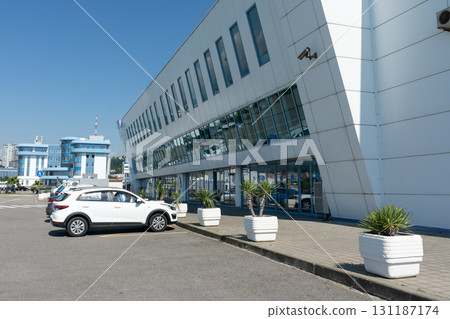 Cars parked in the parking lot near the seaport. 131187174