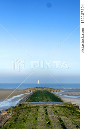 A Serene Coastal Path That Leads to the Iconic Lighthouse, Perfect for Refreshing Walks A Serene Coastal Path That Leads to the Iconic Lighthouse, Perfect for Refreshing Walks 131187204