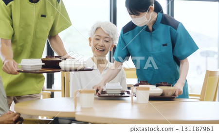 Elderly people waiting for meals at a nursing home 131187961