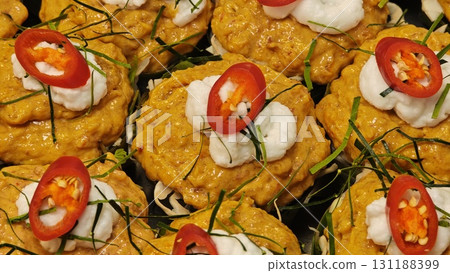 Thai steamed curry fish in banana leaves cup. Thai steamed curry fish in banana leaves cup. 131188399