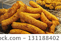 Fried Chinese fish sausage in market. 131188402