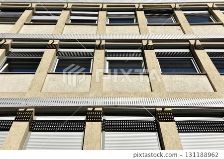 Facade of modern building with windows Facade of modern building with windows 131188962