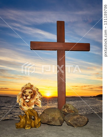 Lion Head And Wooden Christian Cross Sunset Lion Head And Wooden Christian Cross Sunset 131189786