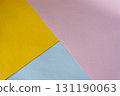 Abstract geometric background with yellow, pink, and blue paper 131190063