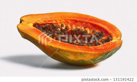 A halved papaya, showing the vibrant orange flesh and glistening black seeds inside A halved papaya, showing the vibrant orange flesh and glistening black seeds inside 131191422