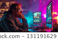 Focused programmer working late night on multiple computer screens with colorful neon lighting in modern home office setup. Technology professional coding and developing software 131191629