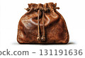 Vintage brown leather drawstring pouch bag with rustic rope ties and weathered texture isolated on white background for historical or western themed projects 131191636