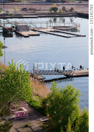 Floating swimming pools with sauna at Allmanna harbour bath in Frihamnen, Gothenburg, Sweden, sunny day Floating swimming pools with sauna at Allmanna harbour bath in Frihamnen, Gothenburg, Sweden, sunny day 131191765