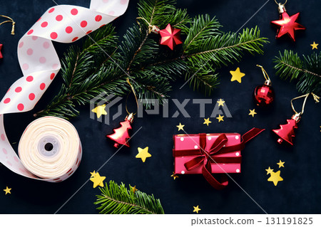 A New Year's or Christmas background with a gift wrapping theme. 131191825
